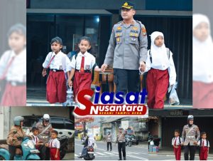 Ciptakan Situasi Tertib dan Aman, Kapolres Belitung Turun Langsung ke Jalan Bantu Para Anak-Anak Sekolah