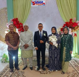 Anggota DPR RI Dr. Maruli Siahaan Hadiri Resepsi Pernikahan