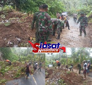 TNI–Polri dan Warga Tahuna Barat Bergotong Royong Bersihkan Matrial Longsor di Tanjakan Meti